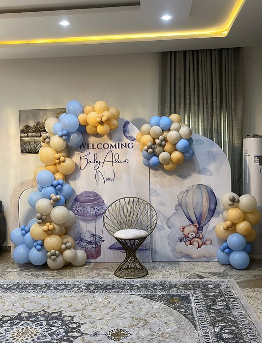 Hot air balloon and teddy bear themed naming ceremony decoration in Jaipur with pastel blue and peach balloons by Shava Moments