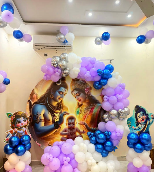 Shiv-Parvati and Bal Krishna themed naming ceremony backdrop with purple and blue balloon arch in Jaipur by Shava Moments.