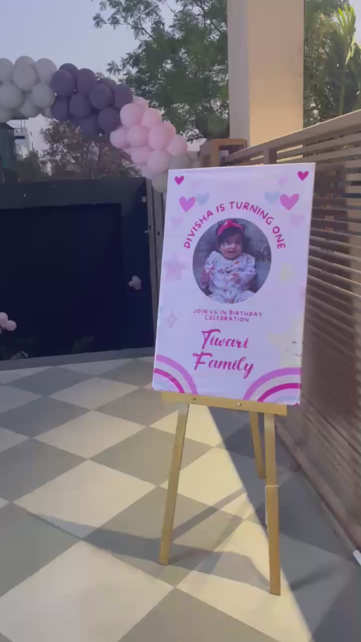Elegant outdoor birthday party setup in Jaipur featuring a pastel and purple balloon entrance arch by Shava Moments